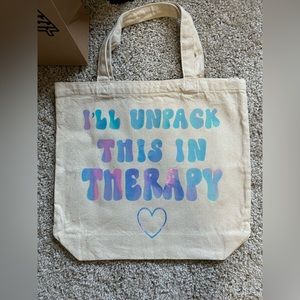 Small tote bag with holographic “I’ll unpack this in therapy”